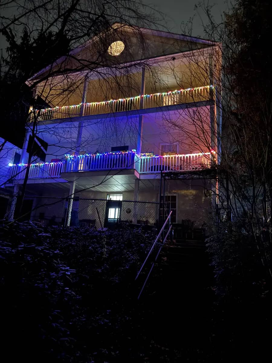 Evening view of the three-level rear porch arrangement